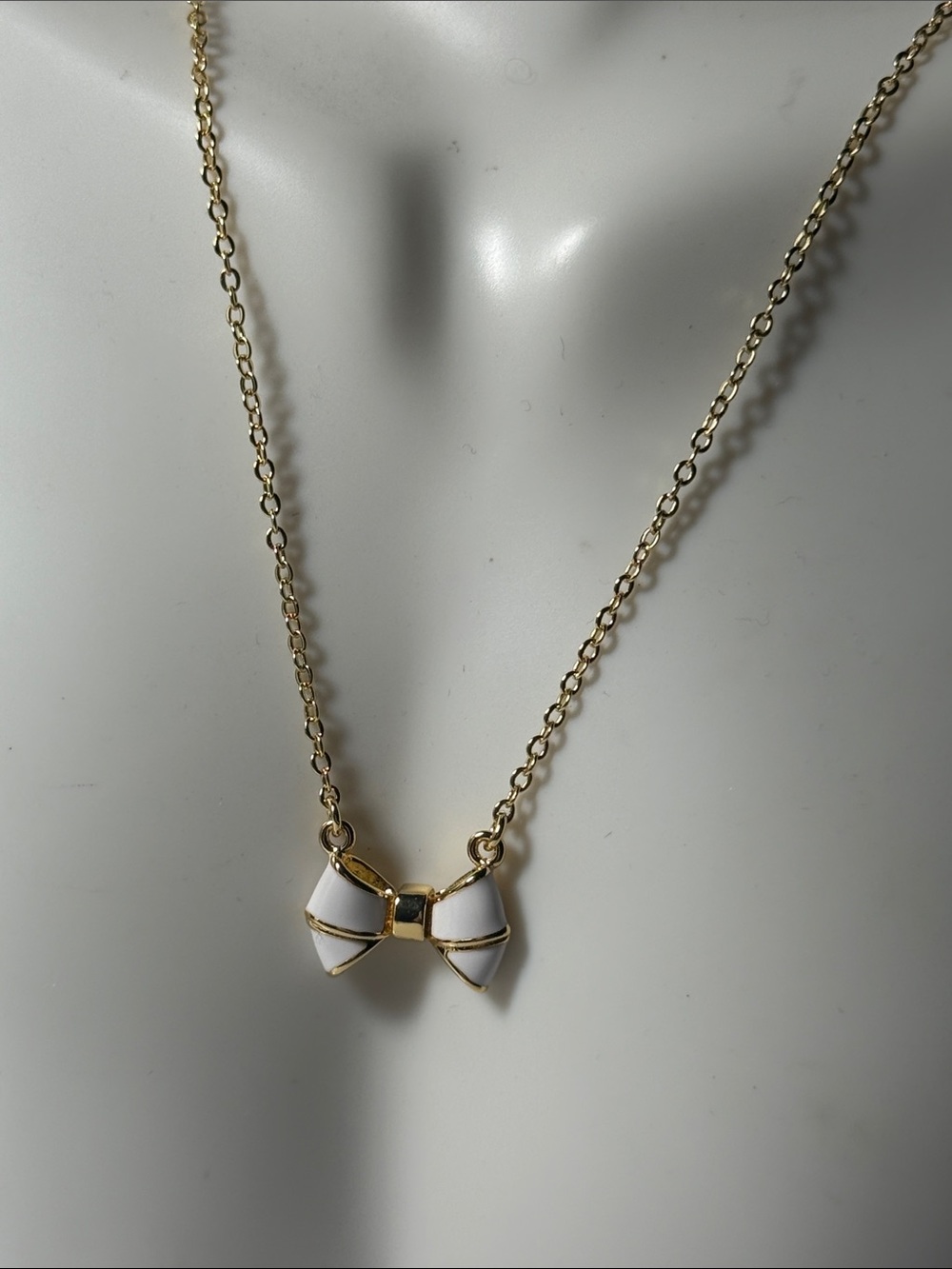 Ted Baker London Gold-Tone Necklace with White Enamel Bow